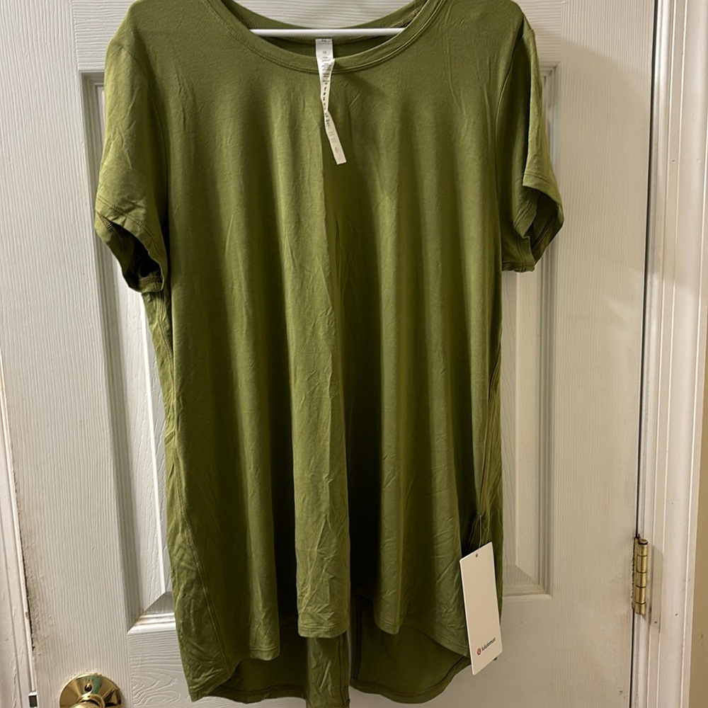 Lululemon top: open up tie back tee size 10 color bronze green